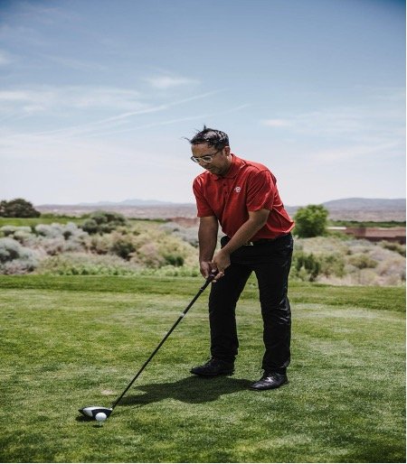A golfer in stance position